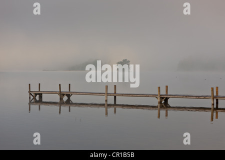 Wharf in the fog on Lake Staffelsee with the island of Woerth near Seehausen, Murnau, Upper Bavaria, Bavaria, PublicGround Stock Photo