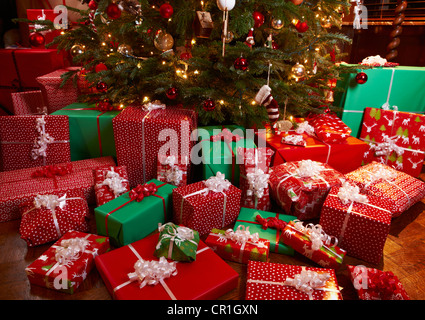 Christmas gifts under tree Stock Photo