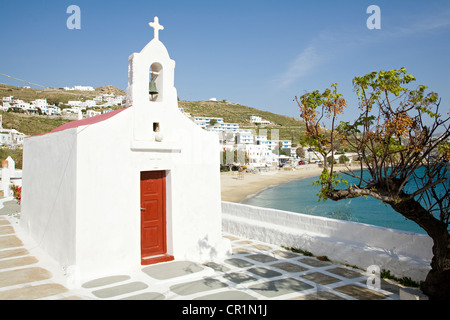 Greece, Cyclades, Mykonos Island, Agios Stefanos, Orthodox Chapel on the seashore Stock Photo