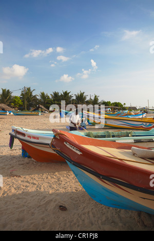 Fishing boats on Negombo beach, North Western Province, Sri Lanka Stock Photo