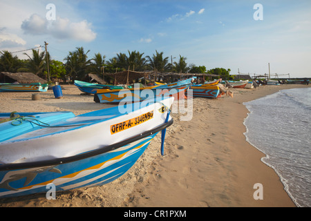 Fishing boats on Negombo beach, North Western Province, Sri Lanka Stock Photo