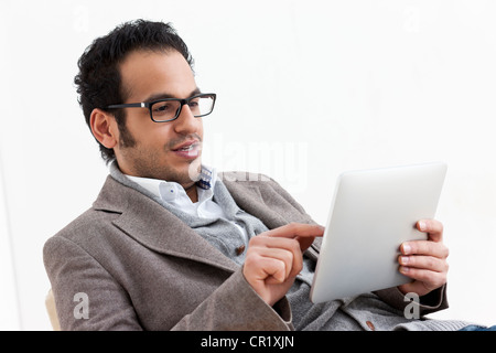 Businessman using tablet computer Stock Photo