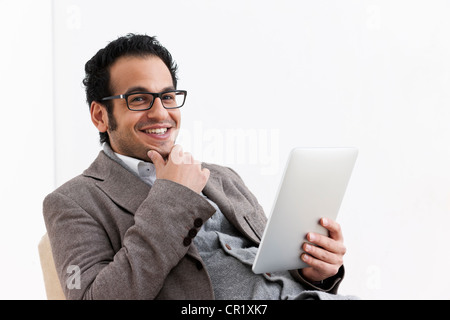 Businessman using tablet computer Stock Photo