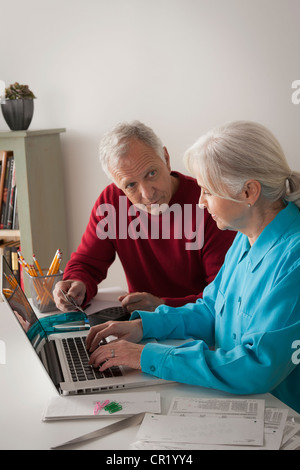 USA, California, Los Angeles, Senior couple working together in home office Stock Photo