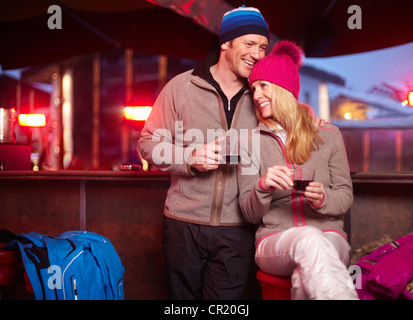 Couple having coffee together at cafe Stock Photo