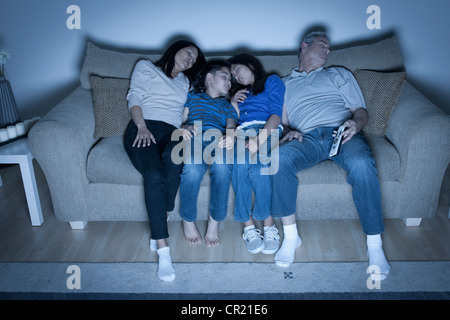 USA, California, Los Angeles, Family sitting on sofa sleeping Stock Photo