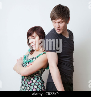 Happy young couple posing in studio Stock Photo