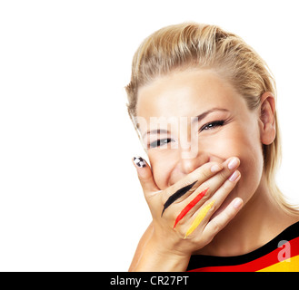 Smiling football fan, closeup on face, female covering mouth with painted in flag colors hand, German team supporter Stock Photo