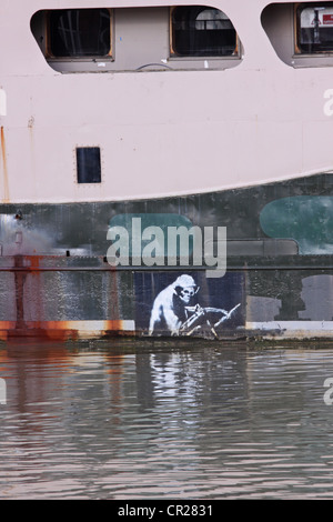 The Grim Reaper depicted by the renowned street artist Banksy on the hull of the Thekla showboat moored in Bristol's Mud Dock Stock Photo