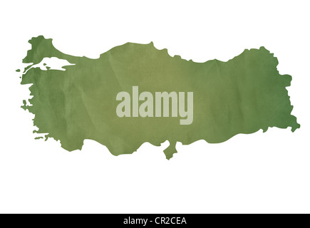 Old green map of Turkey in textured green paper, isolated on white background. Stock Photo