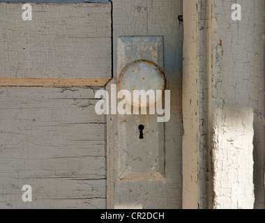 cracking paint on an old weathered door Stock Photo