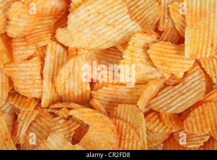 Potato chips colorful abstract background Stock Photo