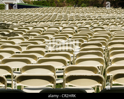 Sea of metal folding chairs Stock Photo