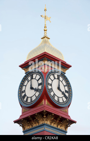 The freshly painted victorian Jubilee clock tower on Weymouth seafront was erected in 1887 to mark fifty years of Queen Victoria’s reign. Dorset, UK. Stock Photo