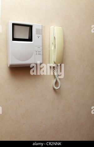 Phone and video observation system on a wall Stock Photo