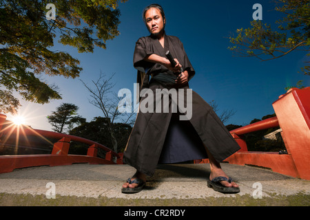 Samurai holds katana Stock Photo