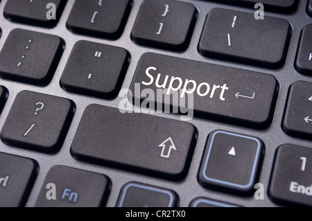 message on keyboard enter key, for online support concepts. Stock Photo