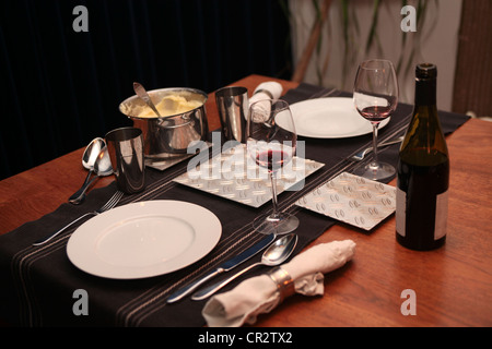 Tablesetting for dinner at home for two Stock Photo