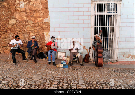 Cuban musicians in a side street, cobbled street, old town, Trinidad, Cuba, Greater Antilles, Caribbean, Central America Stock Photo