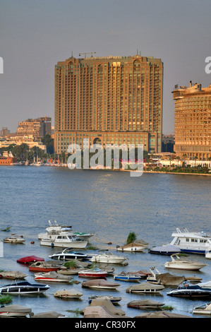 A central Cairo panorama looking east  and north across the Nile River at sunset. Stock Photo