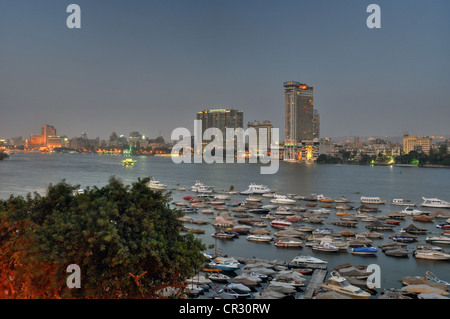 A central Cairo panorama looking east  and north across the Nile River at sunset. Stock Photo