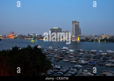 A central Cairo panorama looking east  and north across the Nile River at sunset. Stock Photo