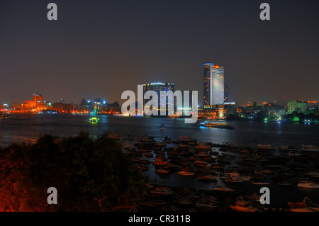 A central Cairo panorama looking east  and north across the Nile River at sunset. Stock Photo