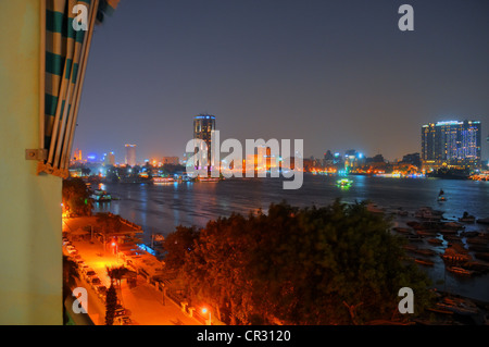 A central Cairo panorama looking east  and north across the Nile River at sunset. Stock Photo