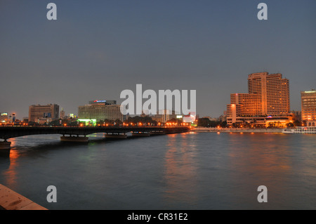 A central Cairo panorama looking east across the Nile River at sunset. Stock Photo