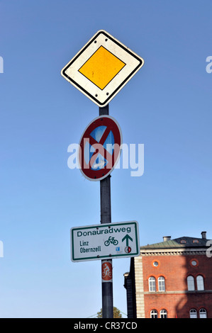 Traffic signs, right-of-way sign, no parking sign, sign of the Danube bicycle path, Passau, Bavaria, Germany, Europe Stock Photo