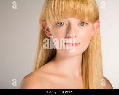 Pale complexion Caucasian girl with blonde / blond hair in her twenties