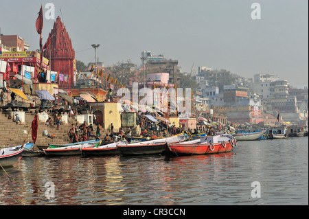 Boats and Ghats or steps on the Ganges River, Varanasi, Benares, Uttar Pradesh, India, South Asia Stock Photo