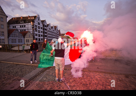 GDANSK,POLAND-JUN 12: italian fans light a benagala in the city of gdnask the evening before italy spain match of Eurocup 2012 the 12th  june 2012 in Gdansk,Poland Stock Photo