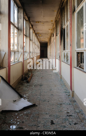 Corridor in an abandoned school Stock Photo
