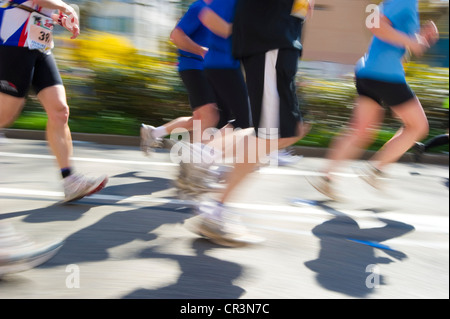 Marathon runners, motion blur, Freiburg Marathon, 3 April 2011, Freiburg im Breisgau, Baden-Wuerttemberg, Germany, Europe Stock Photo