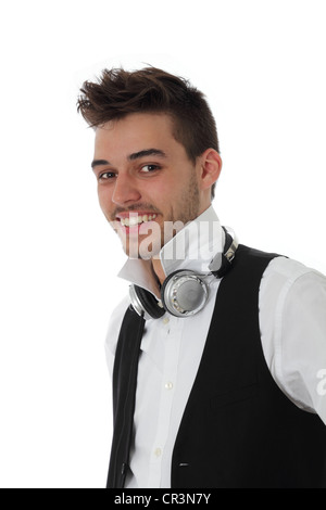 Smiling young man with headphones around his neck isolated on white Stock Photo