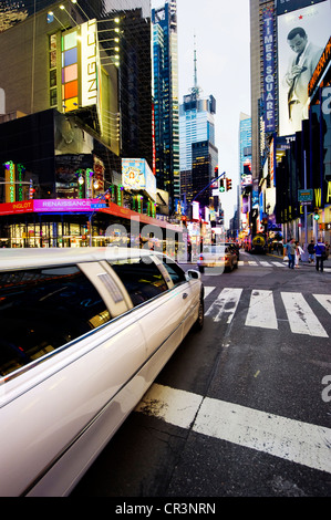 Stretch limousine in Times Square, Manhattan, New York, USA, America Stock Photo