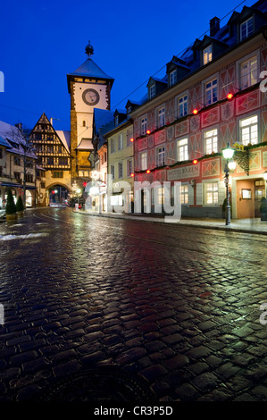 Wintery old town with Schwabentor city gate at Christmas time, Freiburg im Breisgau, Baden-Wuerttemberg, Germany, Europe Stock Photo