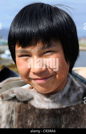 Greenland, city of Nanortalik, Inuit wearing traditional clothes made of seal skin Stock Photo