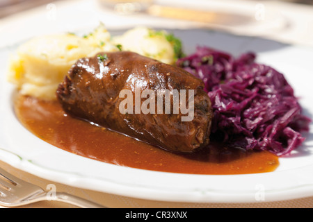 Beef roulade with mashed potatoes and red cabbage Stock Photo