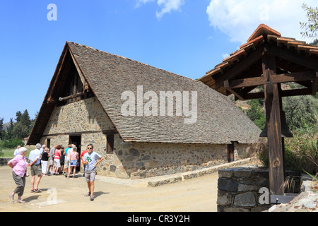 Tourists from a coach tour at the old byzantine church of Panayia Podithou, Galata, Cyprus Stock Photo