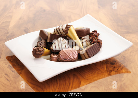 Various chocolates on a plate Stock Photo