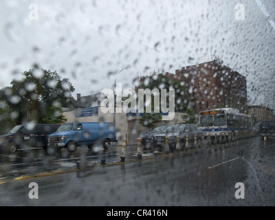 Looking out a bus window on Coney Island Ave on a rainy day in Brooklyn, NY Stock Photo