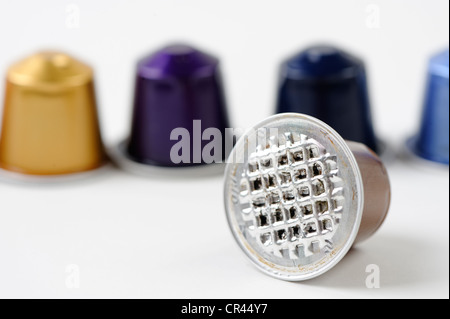 Spent or used empty Nespresso capsules, coffee capsules, aluminium capsules, raw material recycling Stock Photo