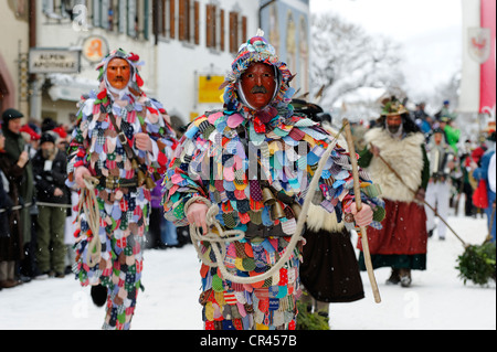 Men dressed in traditional carnival costumes, carnival parade, Maschkera, Mittenwald, Werdenfelser Land, Upper Bavaria Stock Photo