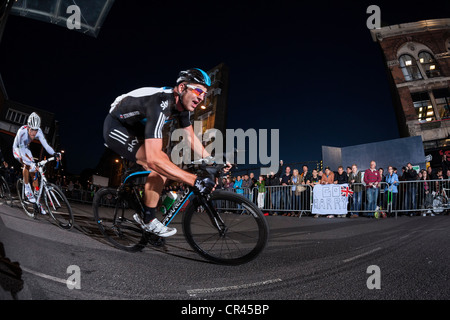 Cyclist Ian Stannard rides around a bend during the Smithfield Market circuit of the London Nocturne 2012 Stock Photo