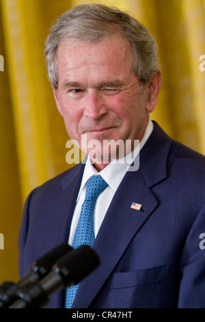 President George W. Bush at a White House ceremony to unveil his official portrait. Stock Photo