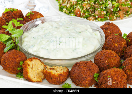 Homemade falafel served with Tzatziki. Stock Photo