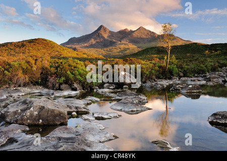 Evening sunlight on the Allt Dearg Mor and Black Cuillin hills on the Isle of Skye, Inner Hebrides, Scotland Stock Photo