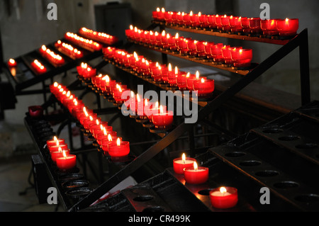 Burning votive candles in a church, St. Martin's Church, Landshut, Lower Bavaria, Bavaria, Germany, Europe Stock Photo